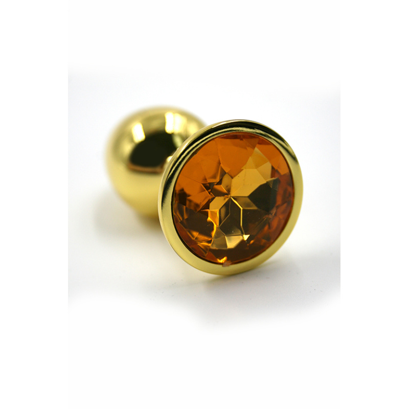 Kanikule, Золотая анальная пробка с ярко-оранжевым кристаллом (Small)